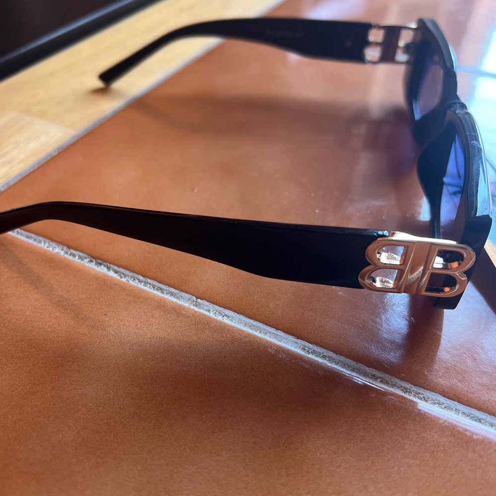 Balenciaga Black Sunglasses with Gold Detailing
